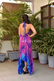 Vestido largo asimétrico con espalda descubierta y bordado
