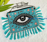Handcrafted Evil Eye Jute Clutch